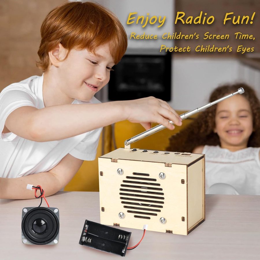 Boy extending the antenna of a CYOEST FM radio kit